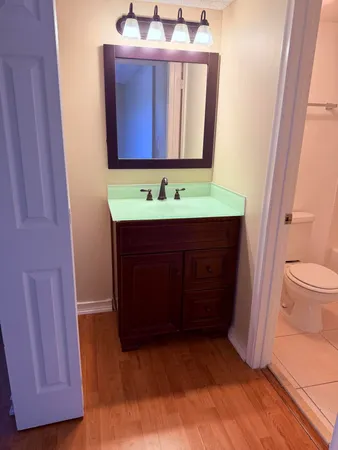 a bathroom with a bathtub and toilet