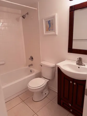 a view of a swimming pool with a yard