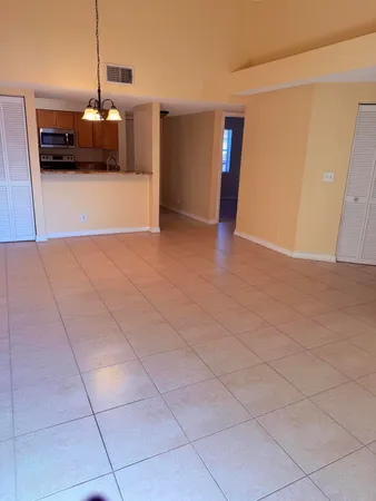 a view of a livingroom with wooden floor