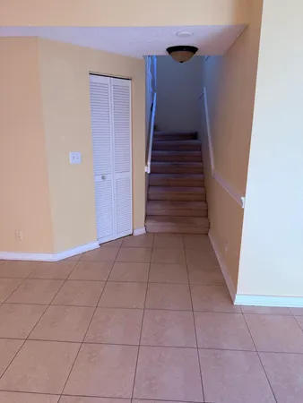 a view of entryway with stairs