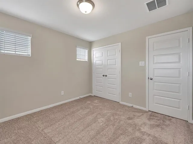 an empty room with closet