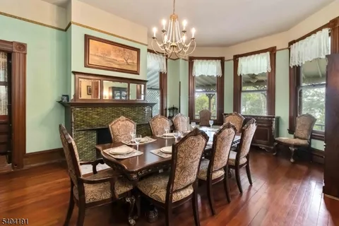 wooden floor in an empty room with a bedroom