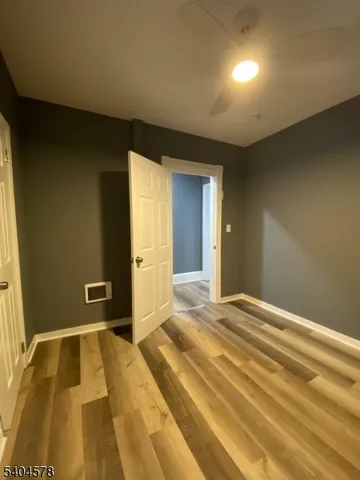 a bedroom with a bed and a walk in closet