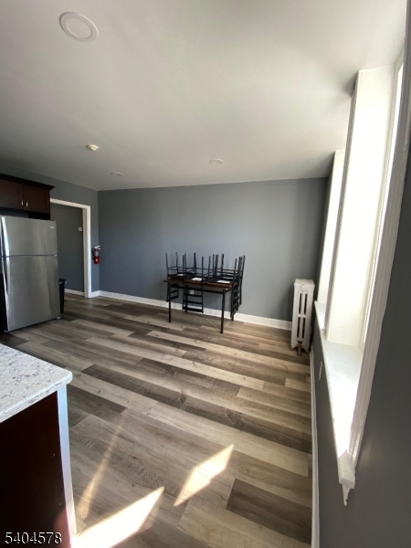 388 South Main Street, Unit 3 Phillipsburg, NJ 08865 - Photo 5 of 16 a view of dining room with furniture and wooden floor