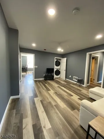 a bed room with a bed and a chair