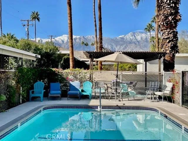a view of swimming pool with a patio