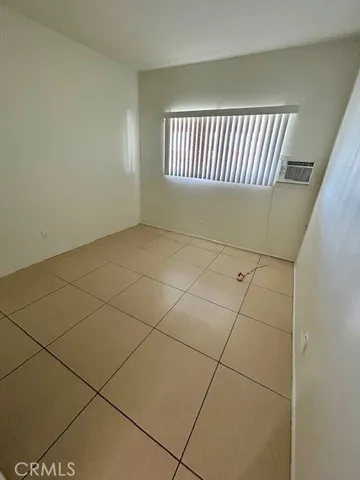 a view of a hallway with a window