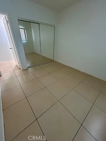 an empty room with mirror