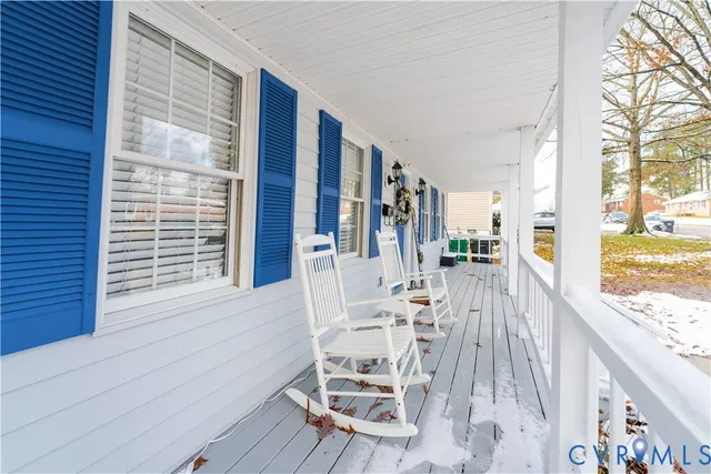 a view of a living room and a large window