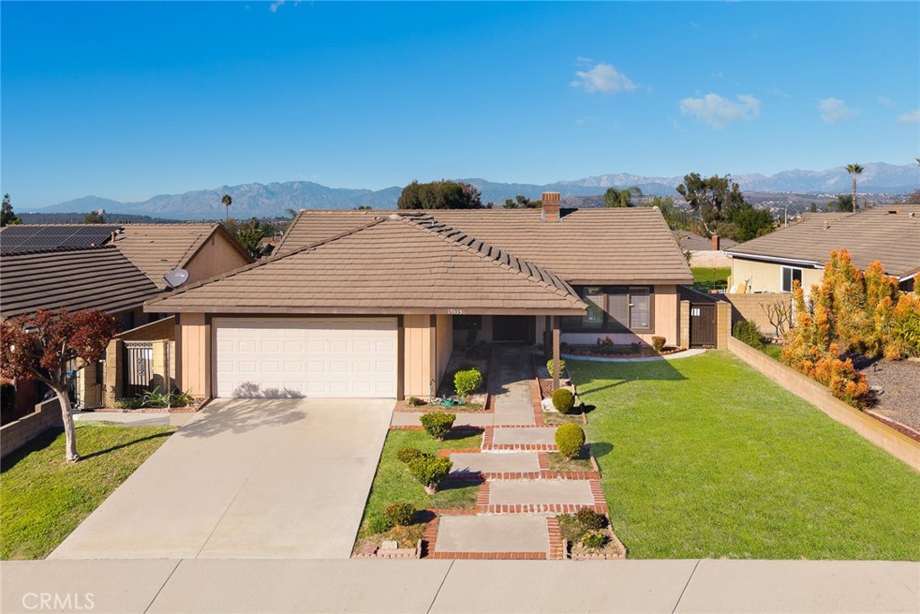 19535 Rogan Court Rowland Heights, CA 91748 - Photo 1 of 1 a front view of a house with a garden and patio
