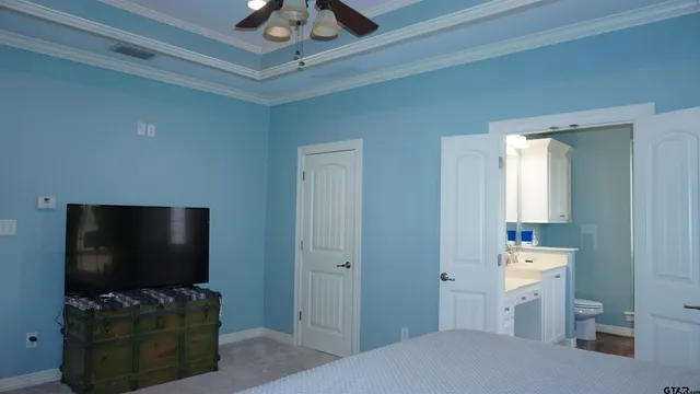 a living room with flat screen tv