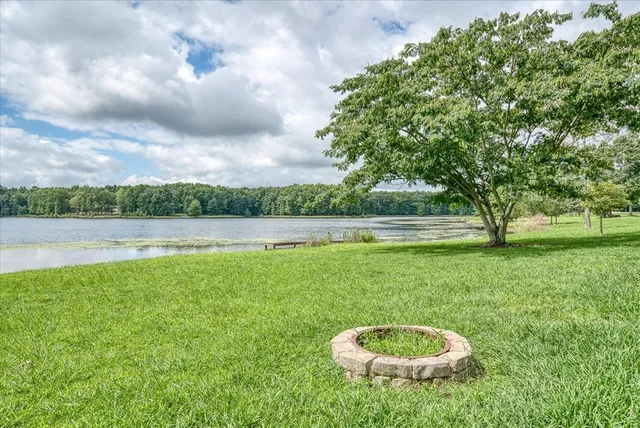 a view of a backyard of the house