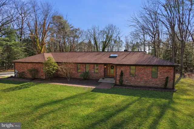 a view of a house with a garden