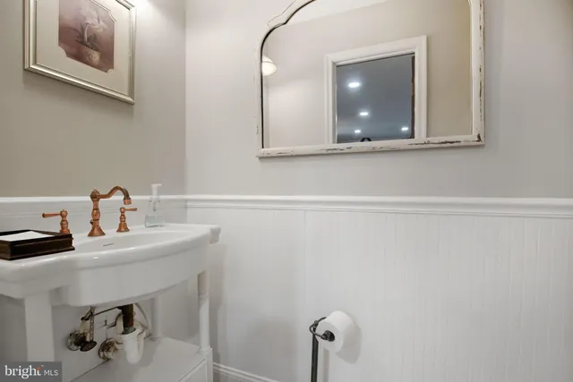 a view of a building with porch and outdoor seating