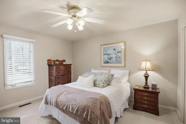 a view of a chairs and table in a patio