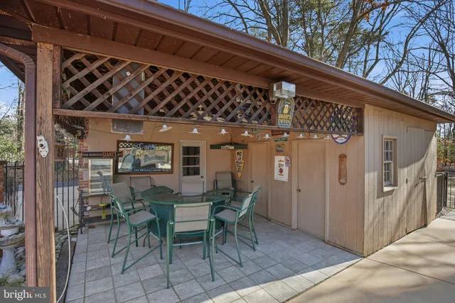 a bathroom with a sink a toilet and a shower