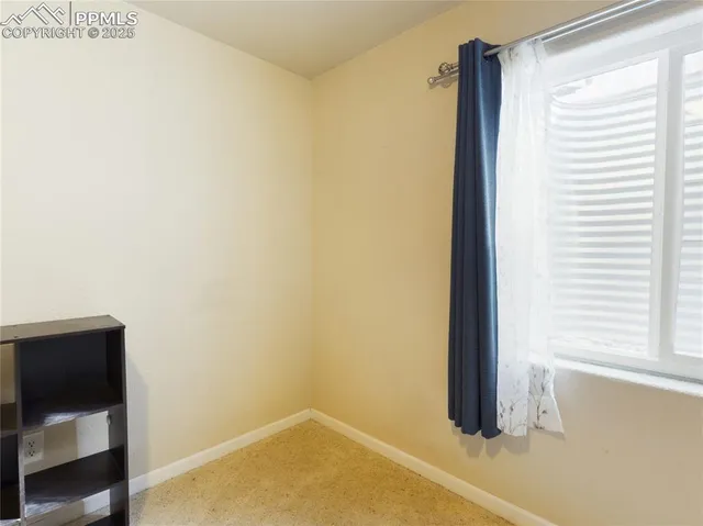 a view of a room with an empty space