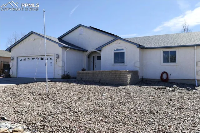 a house view with a backyard