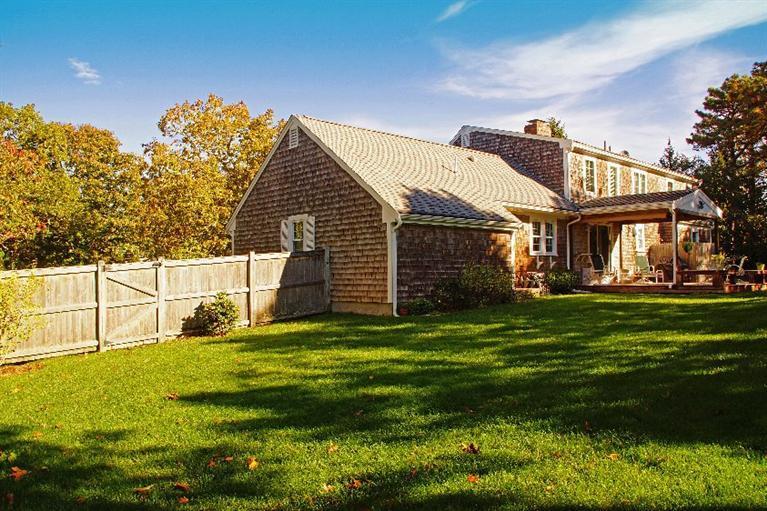 29 Jesse Eldredge Road Harwich, MA 02645 - Photo 3 of 25 a view of a house with a yard