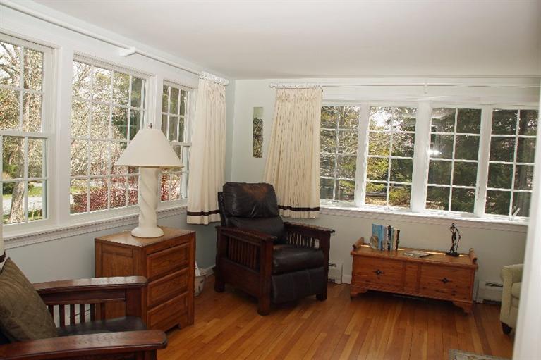 29 Jesse Eldredge Road Harwich, MA 02645 - Photo 9 of 25 a living room with furniture and a large window