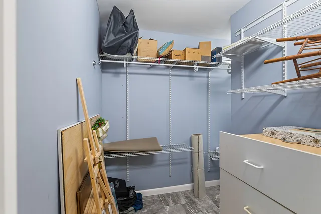 a spacious bathroom with a tub shower and sink