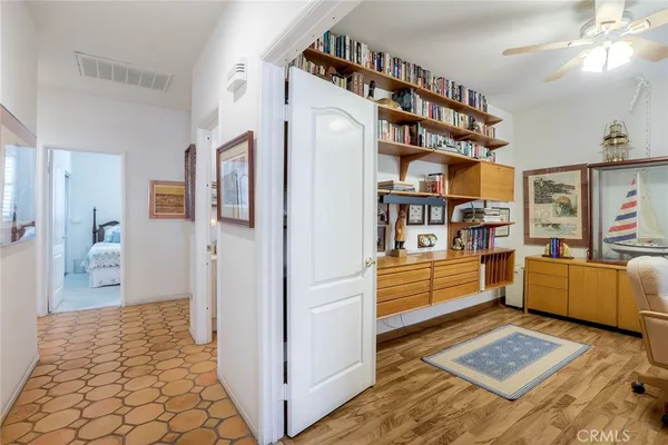 a room with furniture and wooden floor