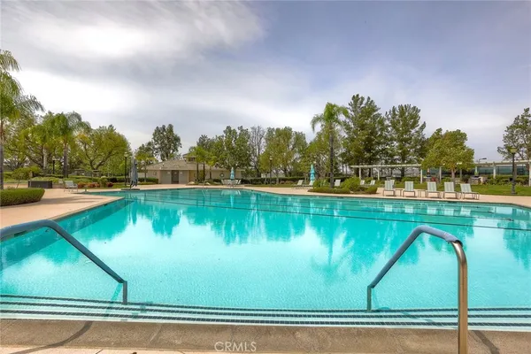 a view of swimming pool from a balcony