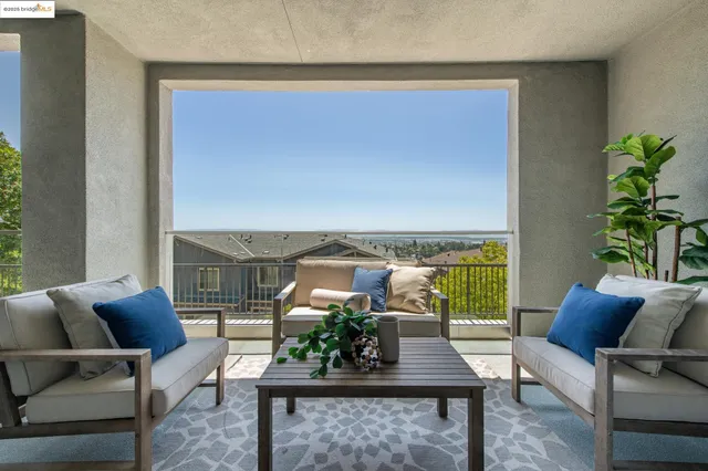 a large kitchen with a table and chairs