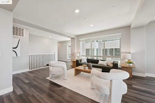 a open kitchen with stainless steel appliances granite countertop a stove and kitchen island