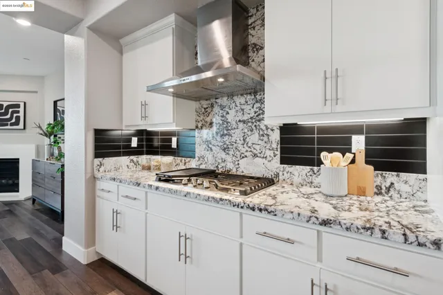 a bedroom with bed and large window