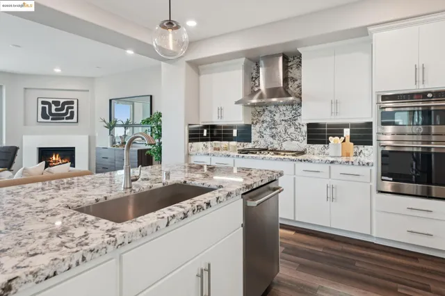 a bedroom with a bed and couch