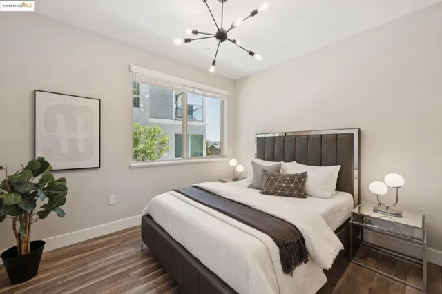 a living room with furniture and windows