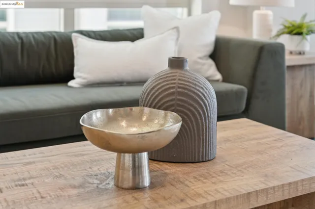 a outdoor living space with furniture and a fireplace