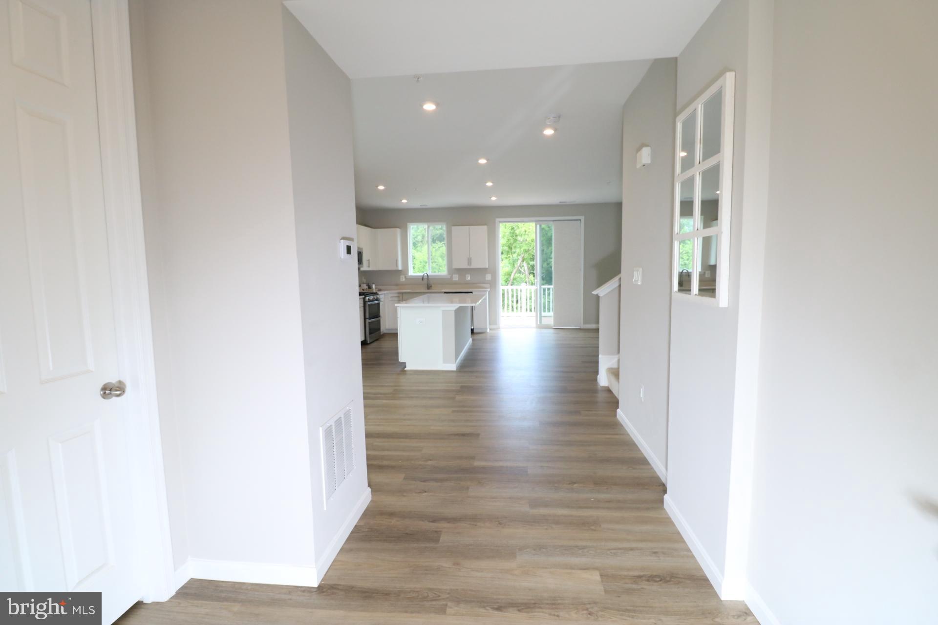 12312 Fallen Timbers Circle Hagerstown, MD 21740 - Photo 13 of 28 a view of a living room with wooden floor
