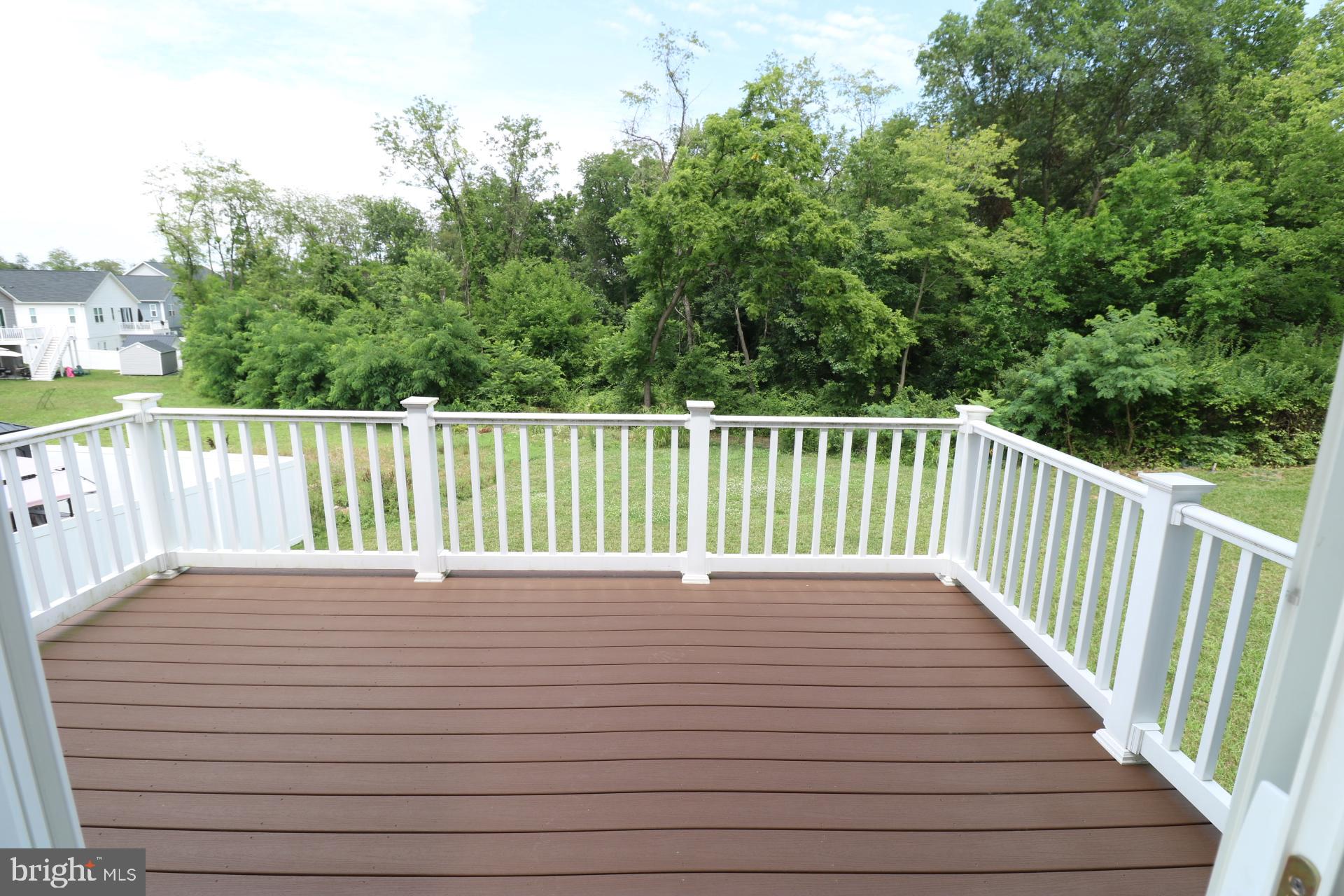 12312 Fallen Timbers Circle Hagerstown, MD 21740 - Photo 19 of 28 a view of a balcony with wooden floor