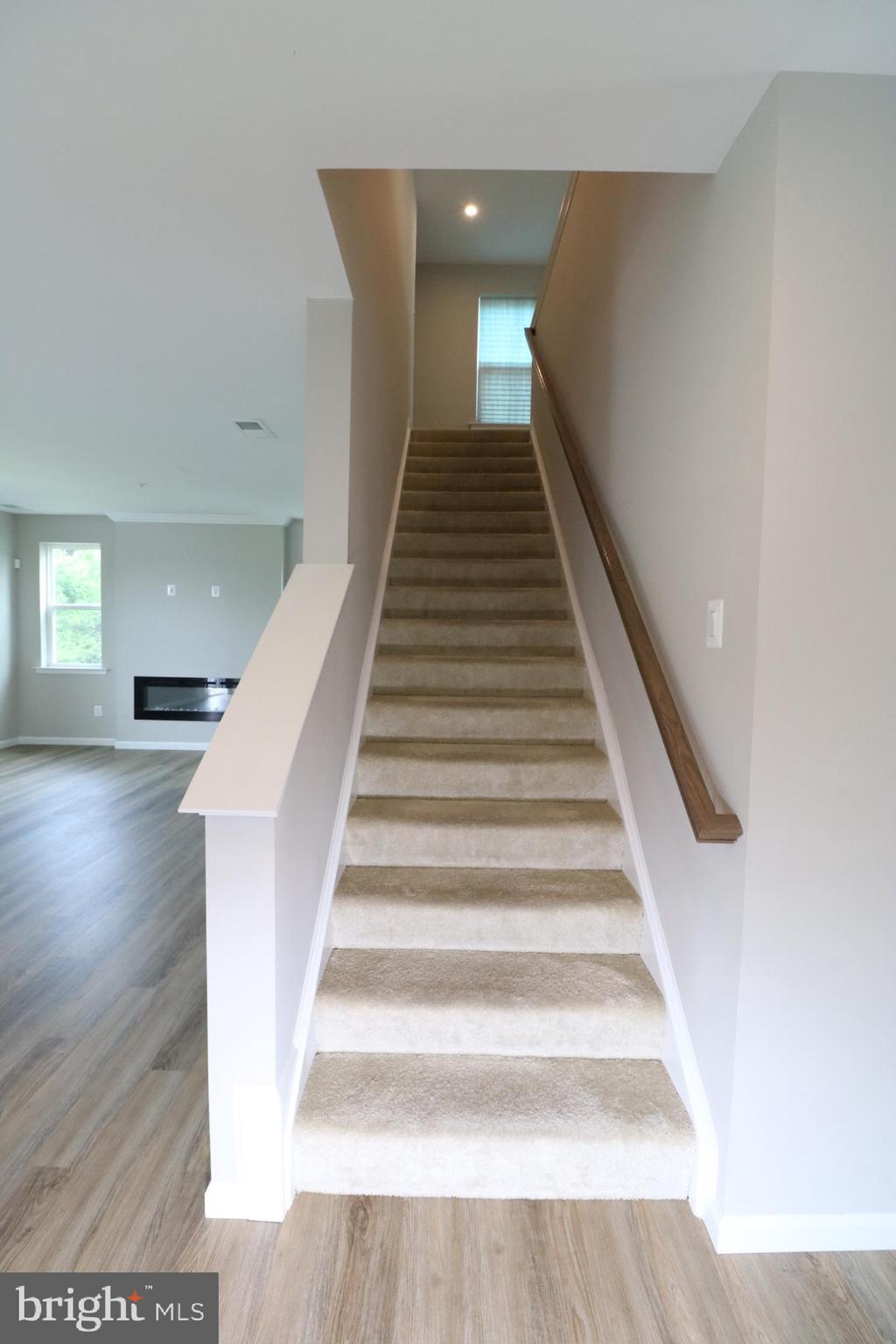 12312 Fallen Timbers Circle Hagerstown, MD 21740 - Photo 23 of 28 a view of entryway and hall with wooden floor