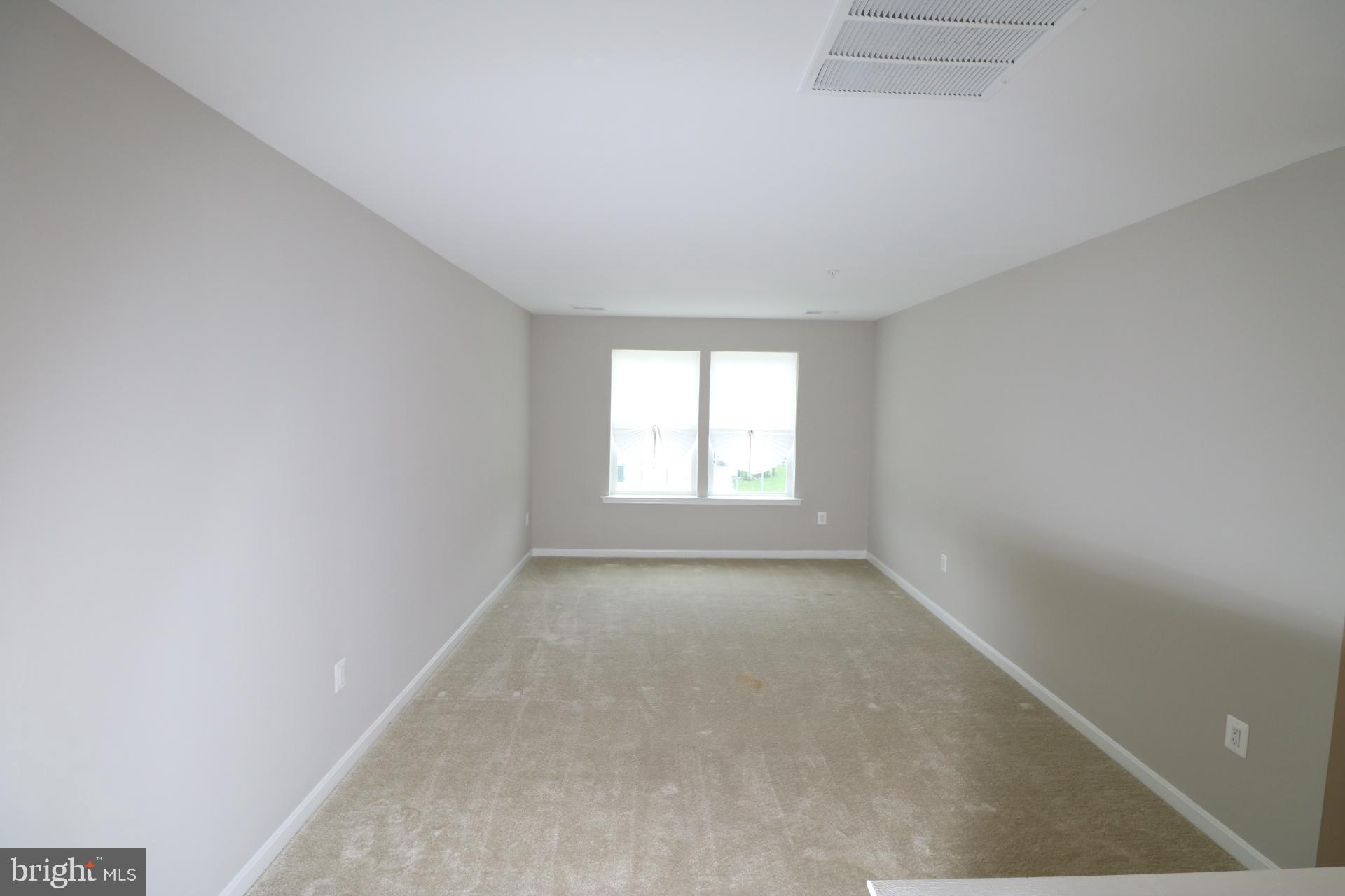 12312 Fallen Timbers Circle Hagerstown, MD 21740 - Photo 25 of 28 a view of an empty room with a window