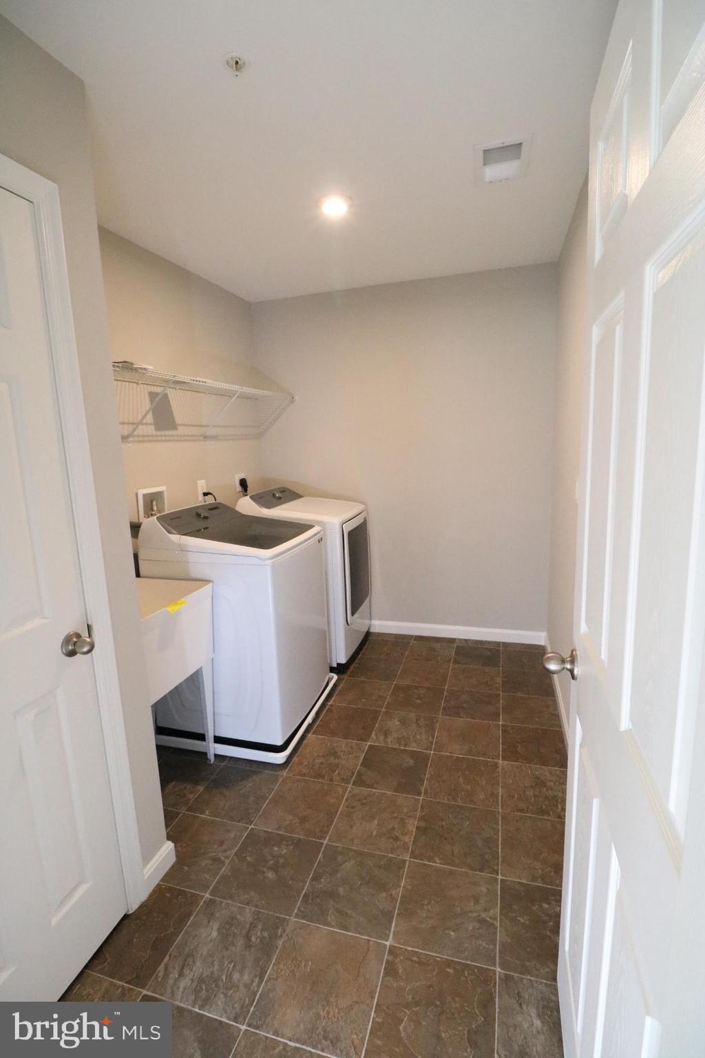 12312 Fallen Timbers Circle Hagerstown, MD 21740 - Photo 27 of 28 a bathroom with a sink a toilet and shower
