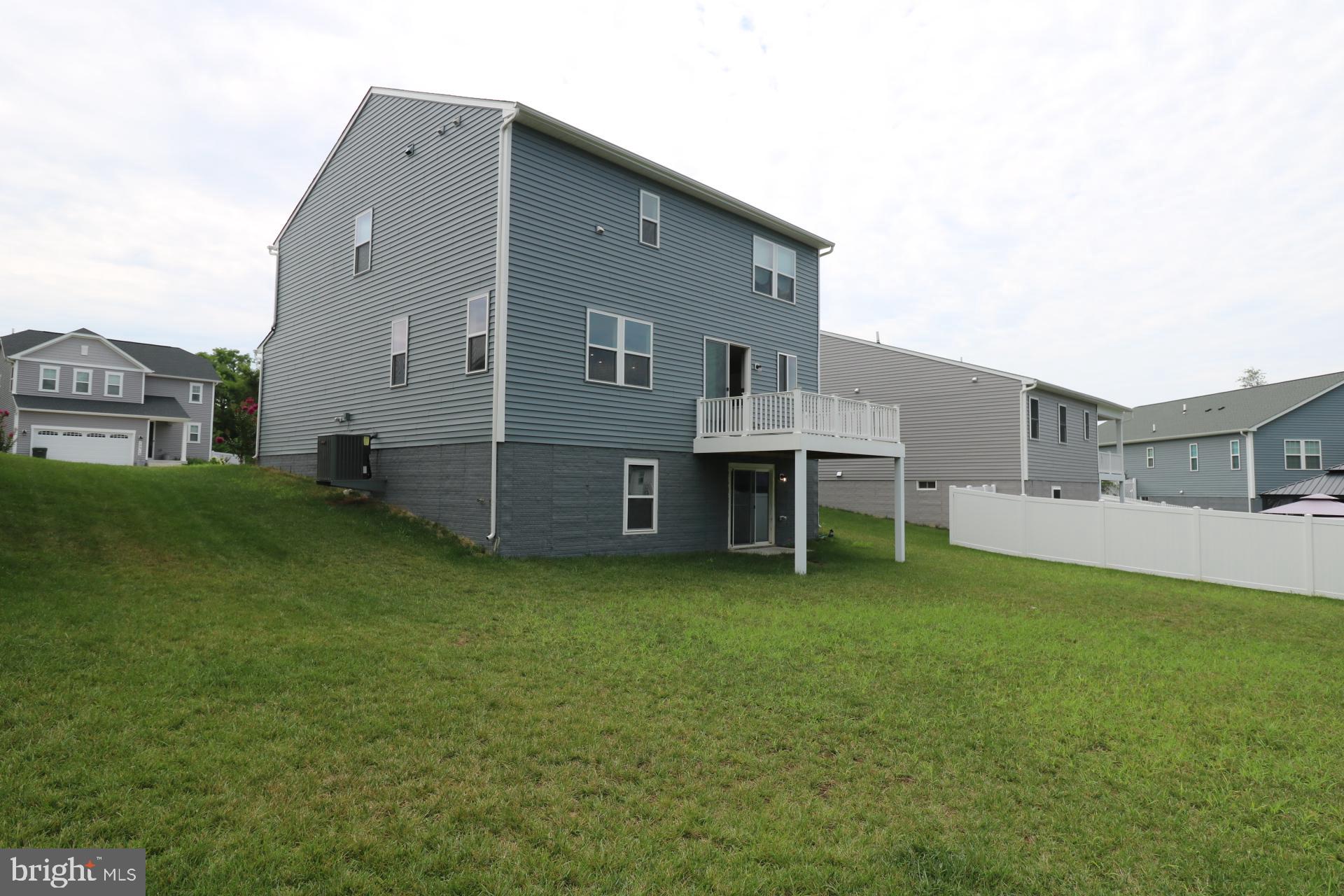 12312 Fallen Timbers Circle Hagerstown, MD 21740 - Photo 8 of 28 a view of a house with a backyard