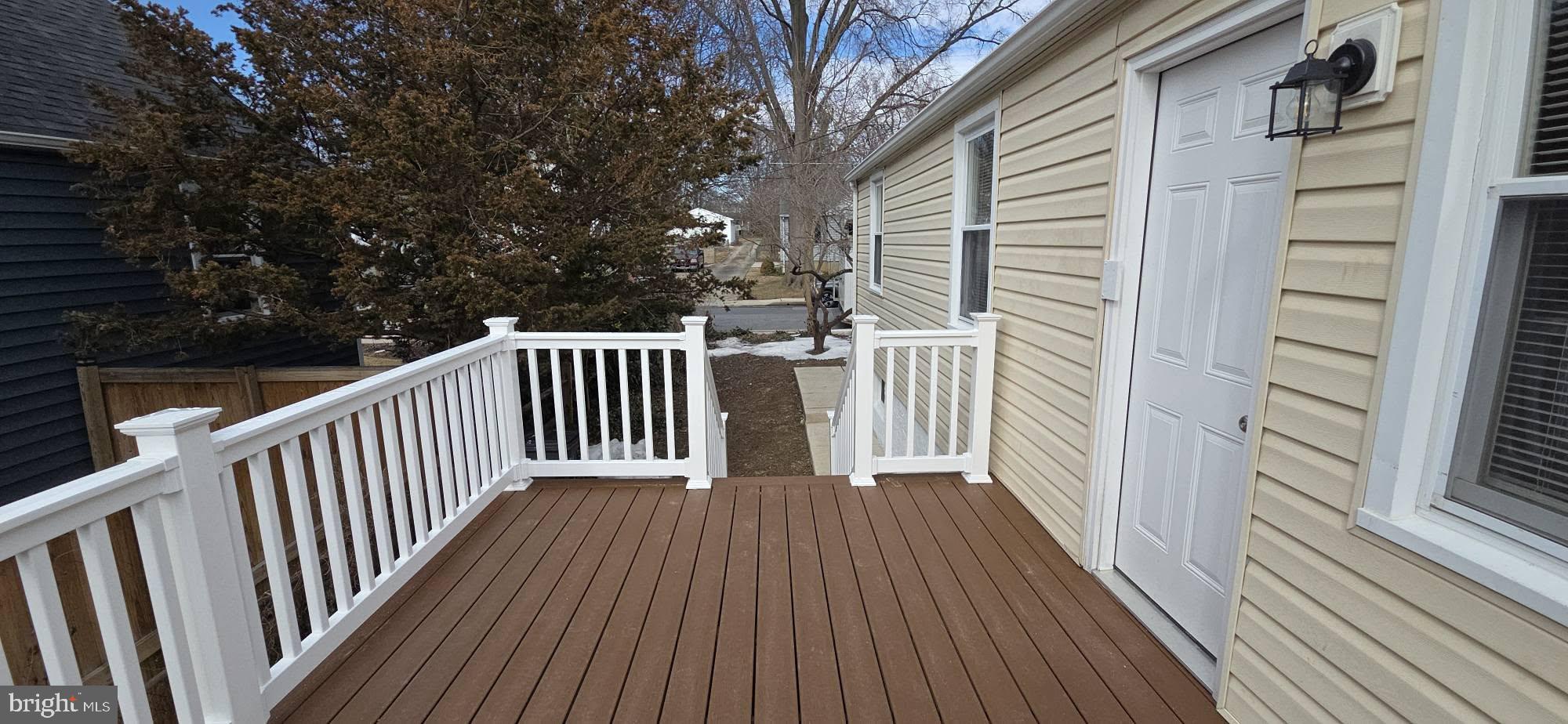 2329 Foster Avenue Baltimore, MD 21234 - Photo 11 of 47 New PVC deck with vinyl rails.
