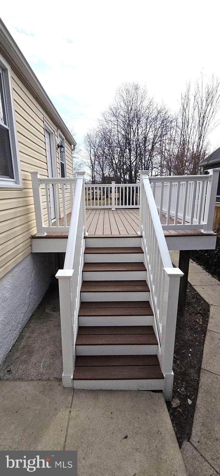 2329 Foster Avenue Baltimore, MD 21234 - Photo 13 of 47 New PVC deck with vinyl rails.