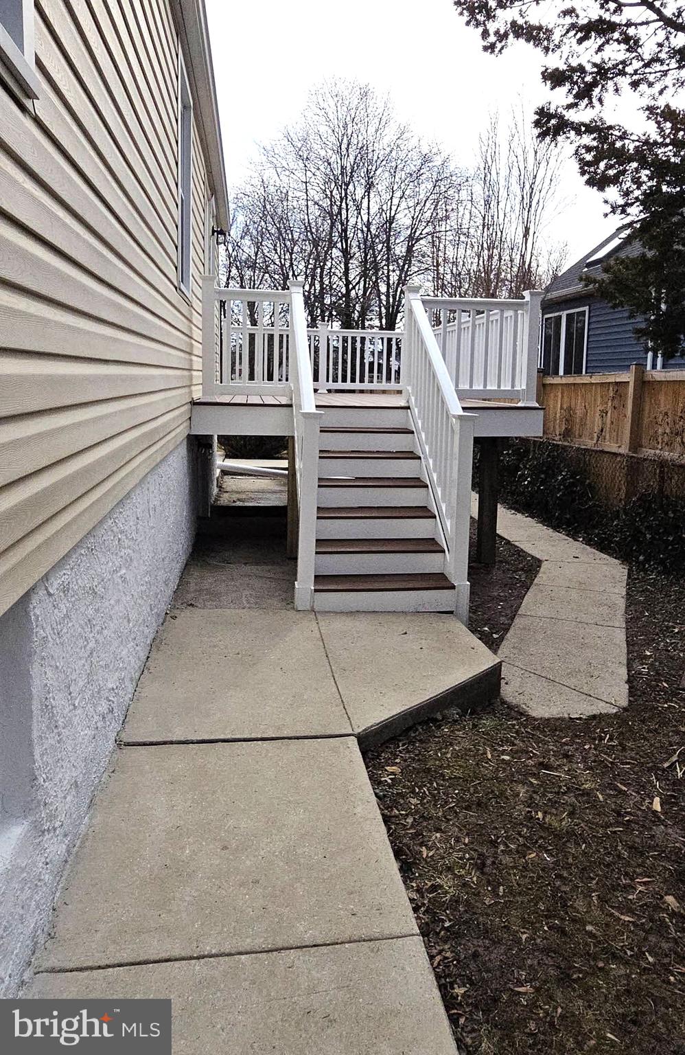 2329 Foster Avenue Baltimore, MD 21234 - Photo 14 of 47 Front concrete walkways lead to the deck.