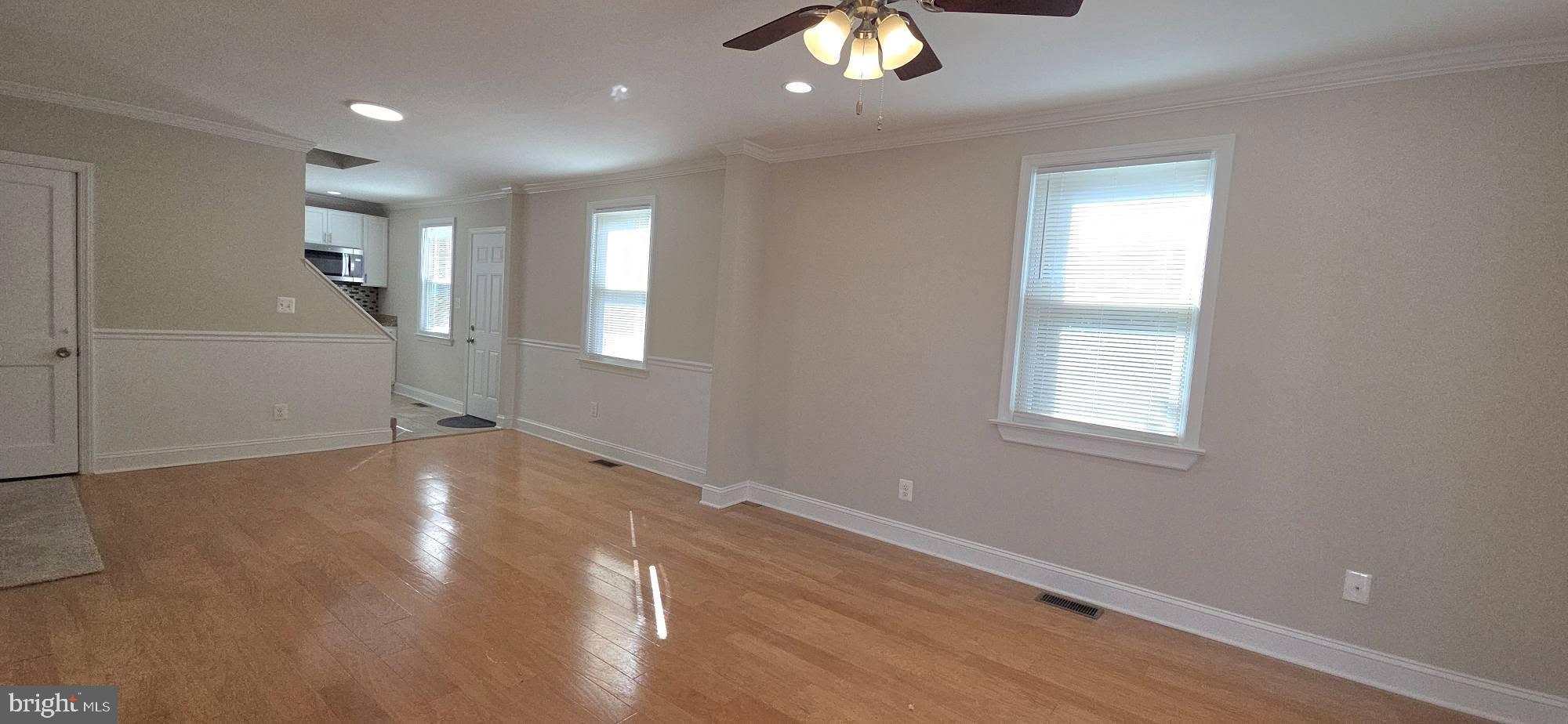 2329 Foster Avenue Baltimore, MD 21234 - Photo 15 of 47 Gleaming hardwood floors in the living & dining rm