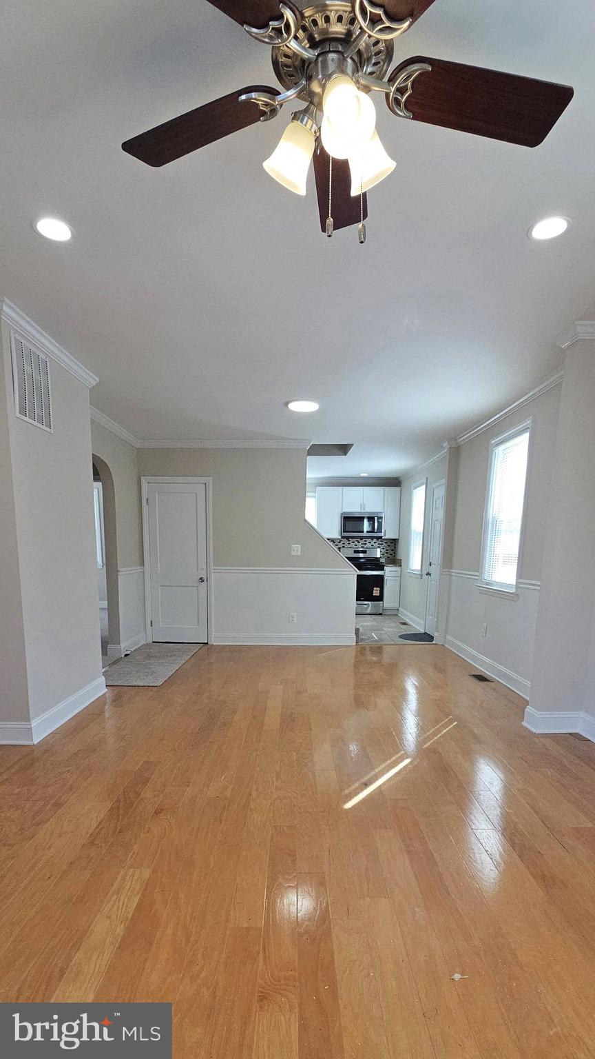 2329 Foster Avenue Baltimore, MD 21234 - Photo 17 of 47 Gleaming hardwood floors in the living & dining rm