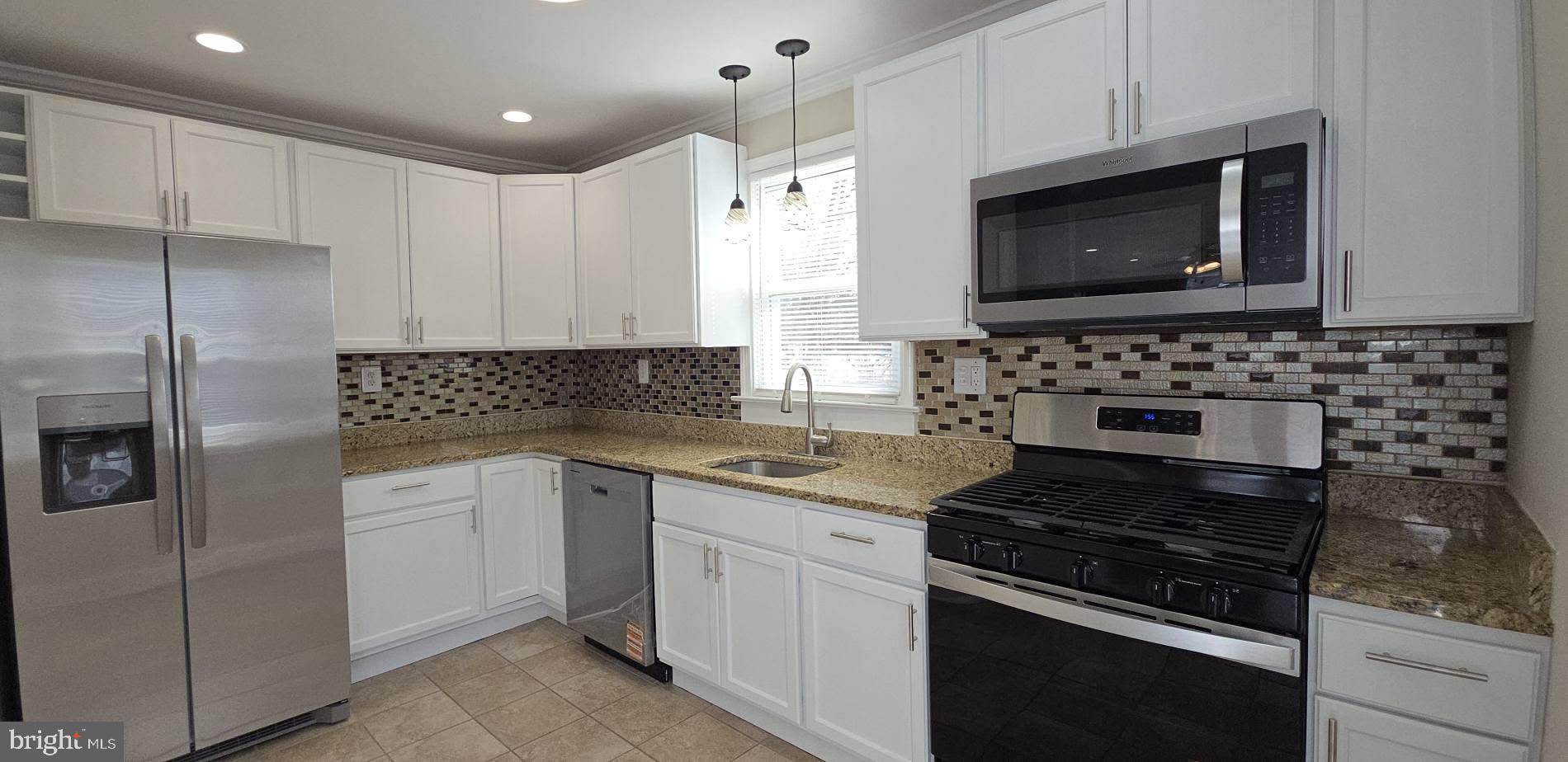 2329 Foster Avenue Baltimore, MD 21234 - Photo 19 of 47 Modern kitchen with granite tops & new appliances.