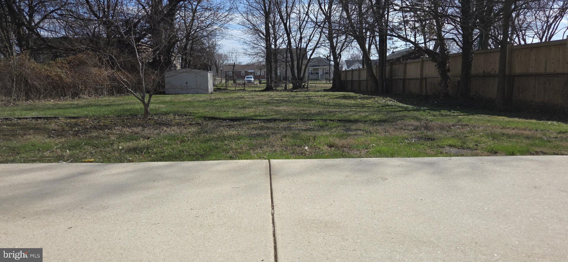 2329 Foster Avenue Baltimore, MD 21234 - Photo 7 of 47 Beautiful concrete patio and expansive yard.