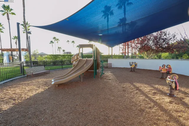 a view of swimming pool with outdoor seating