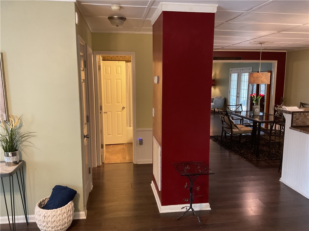 229 Cub Cove Drive Walhalla, SC 29691 - Photo 32 of 50 This inviting interior features elegant dark wood flooring and a classic white door.