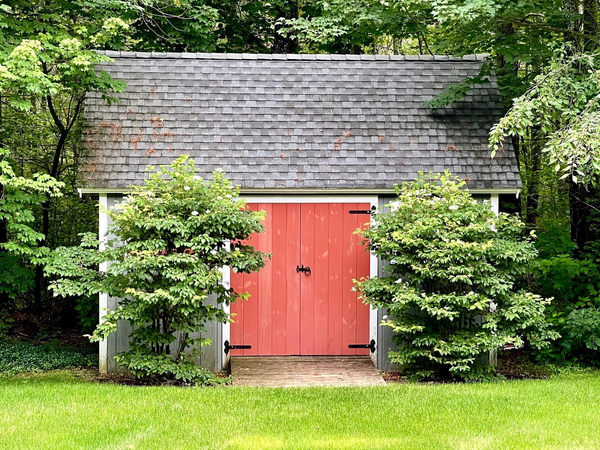 52 Maguire Road Kennebunk, ME 04043 - Photo 53 of 65 shed is on the back woods line