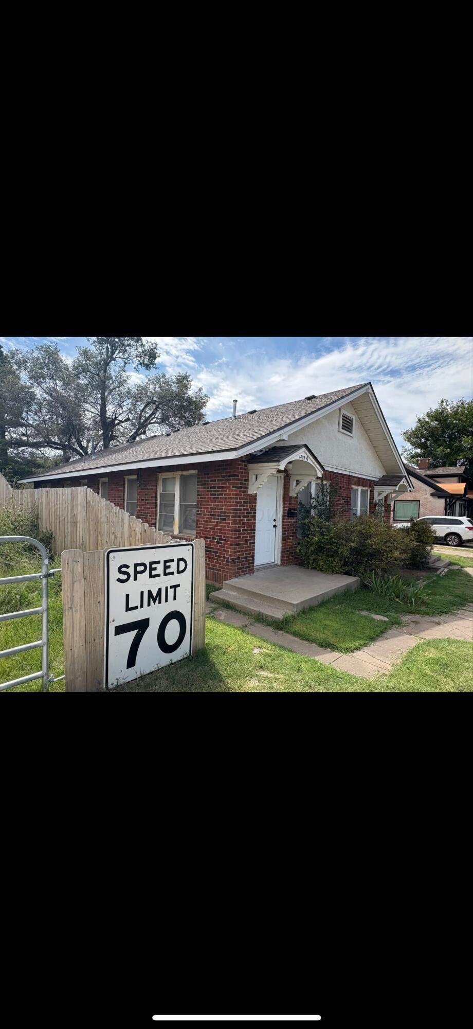 1209 Southwest 10th Avenue Amarillo, TX 79101 - Photo 2 of 6 a view of outdoor space with deck and outdoor kitchen